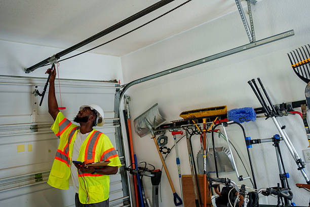 Professional Garage Door Installation technician working in New Hartford Center, CT